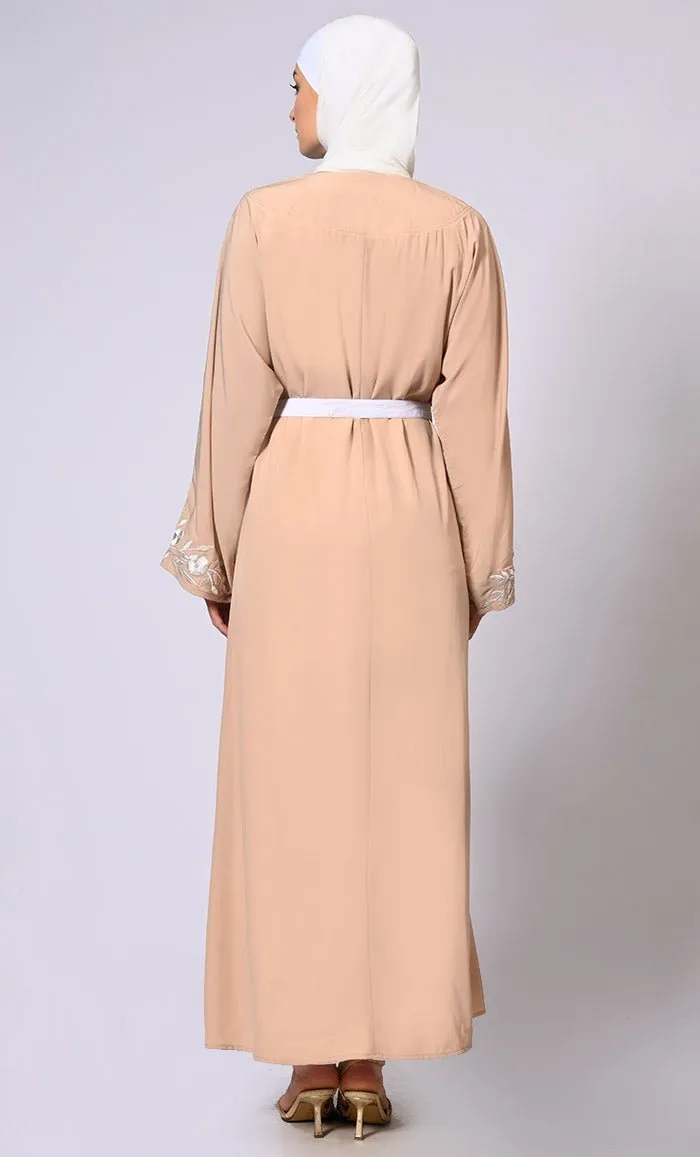 Embroidered Enchantment: Graceful Sand Abaya with Delicate Details and Belt - Final Sale